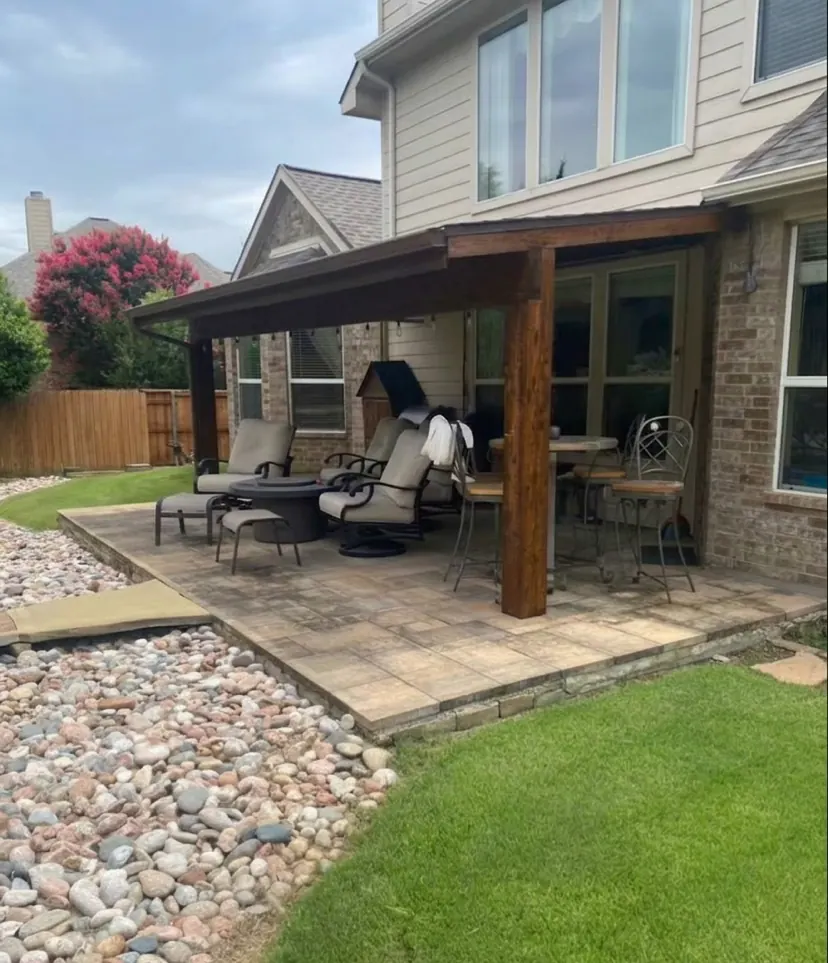 Dark-stained cedar patio cover over a backyard paver patio in McKinney, TX by Masco Pros